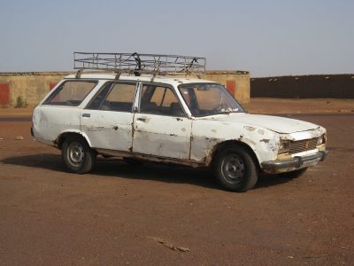Battered 7 seater Peugeot estate - a typical bush taxi